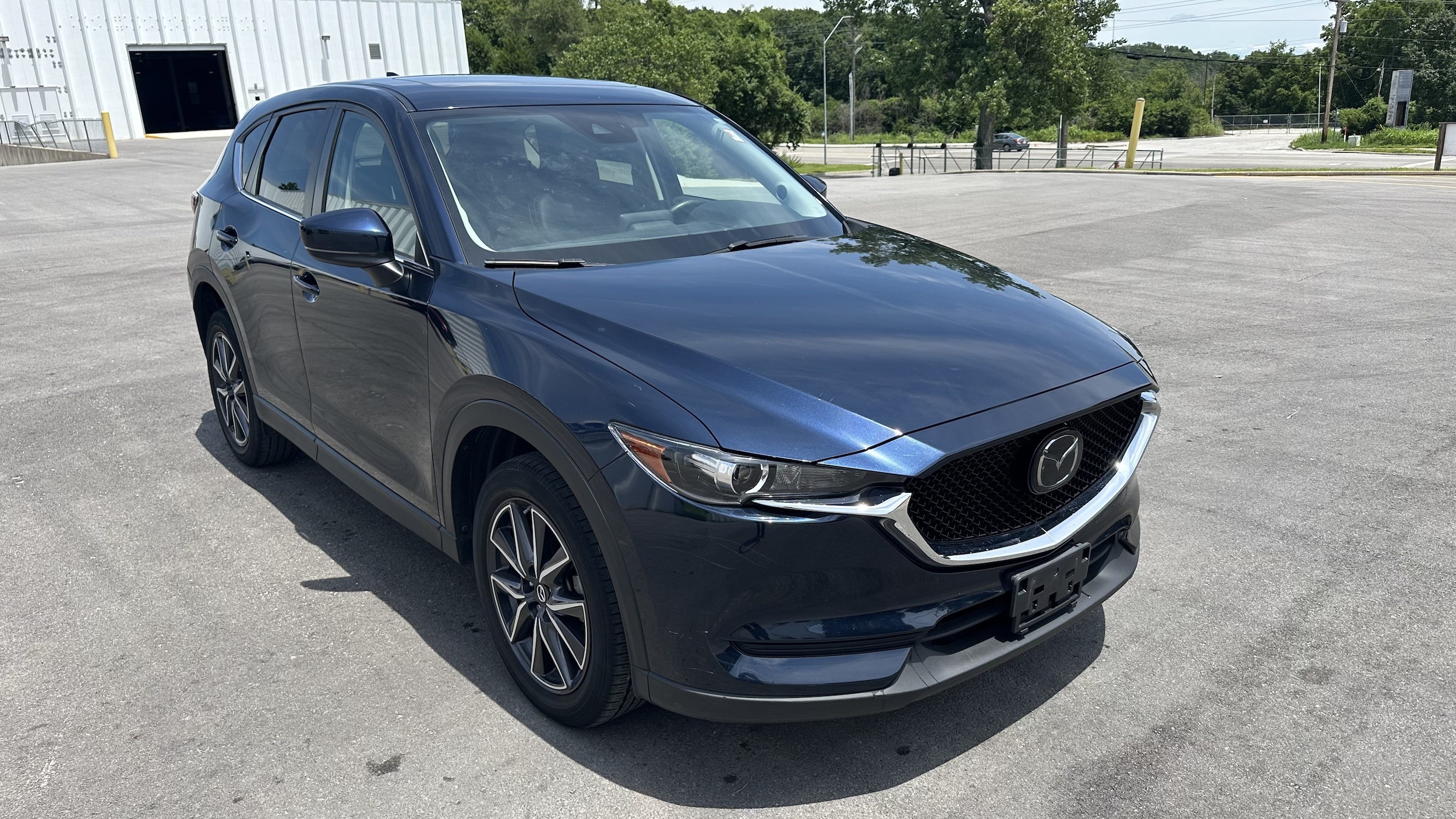 Used 2018 Mazda CX-5 Touring with VIN JM3KFACM9J1452138 for sale in Kansas City