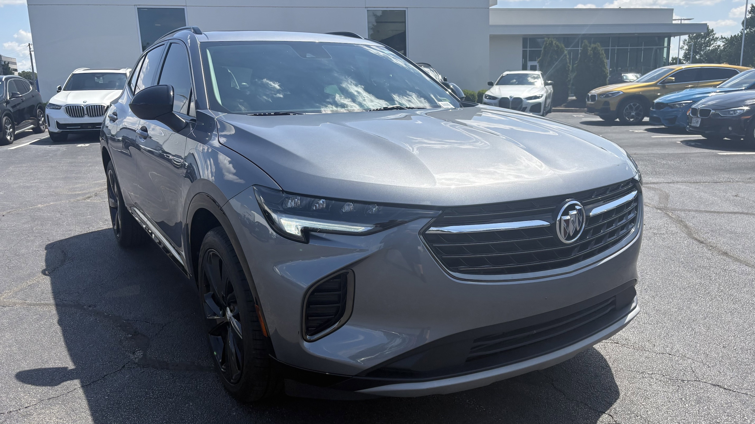 Used 2021 Buick Envision Essence with VIN LRBFZPR45MD077653 for sale in Kansas City
