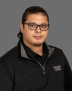 Staff member Carlos Valdez from ID_6188279c05e8