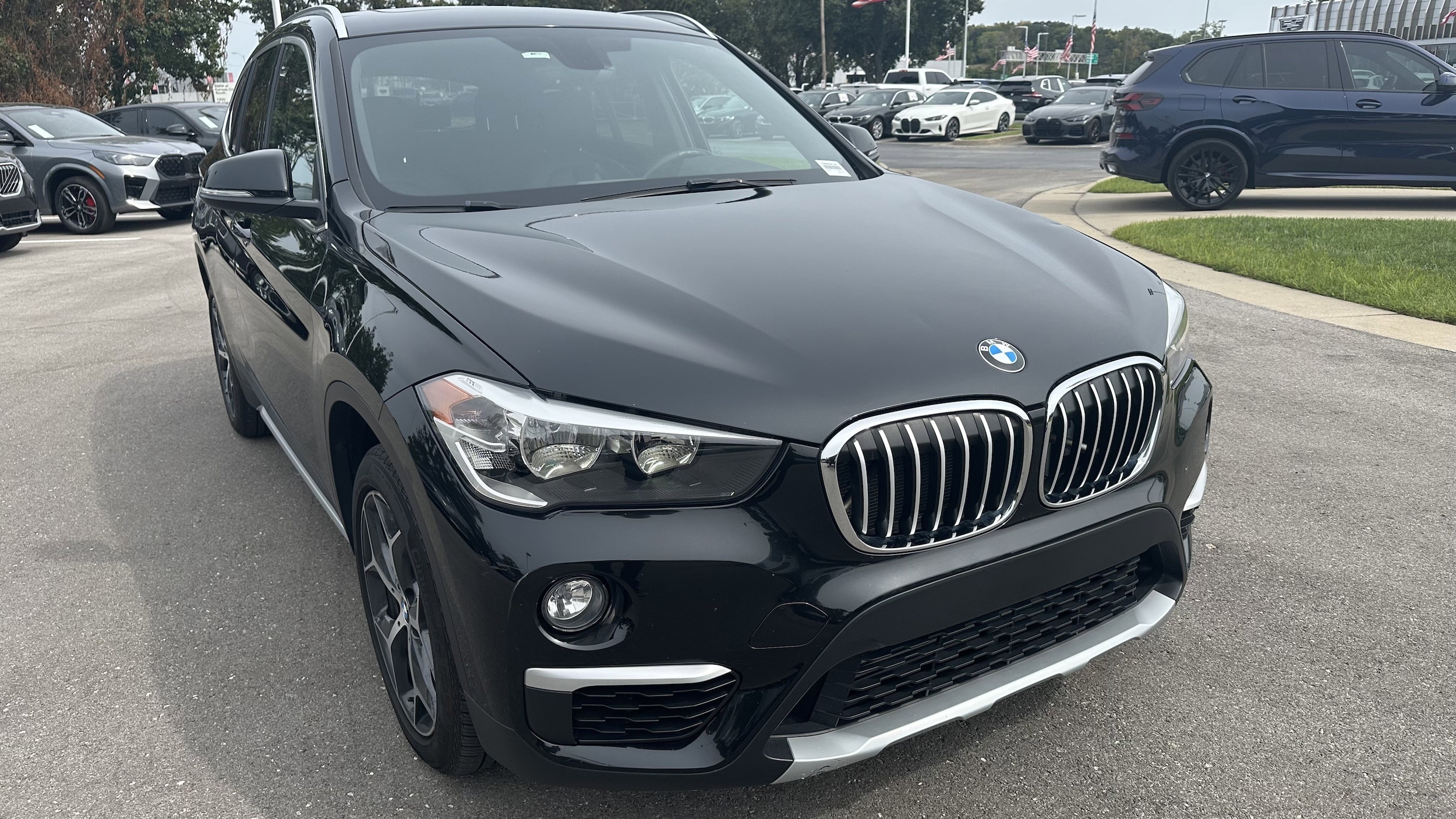 Used 2018 BMW X1 28i with VIN WBXHU7C33J5L08597 for sale in Kansas City