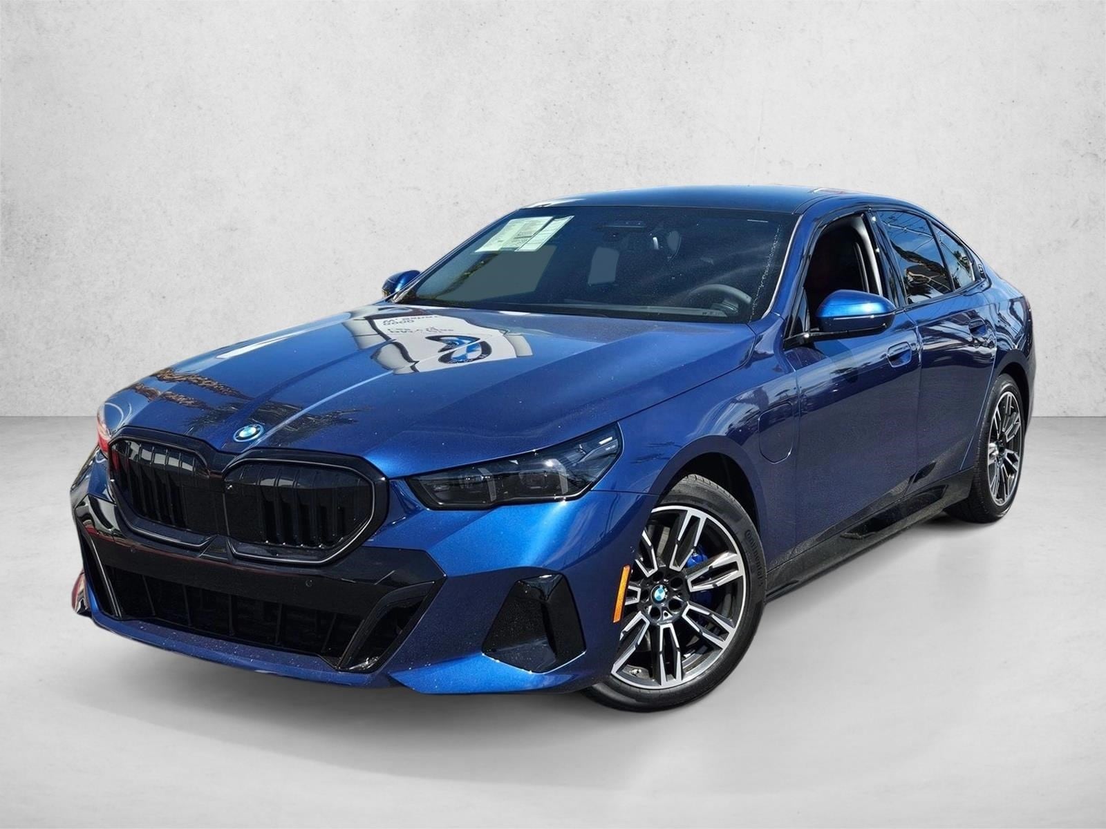 2026 BMW 5 Series 550e xDrive Sedan's photo