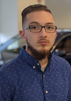Staff member Tyler Baldwin from e000e7fe8789