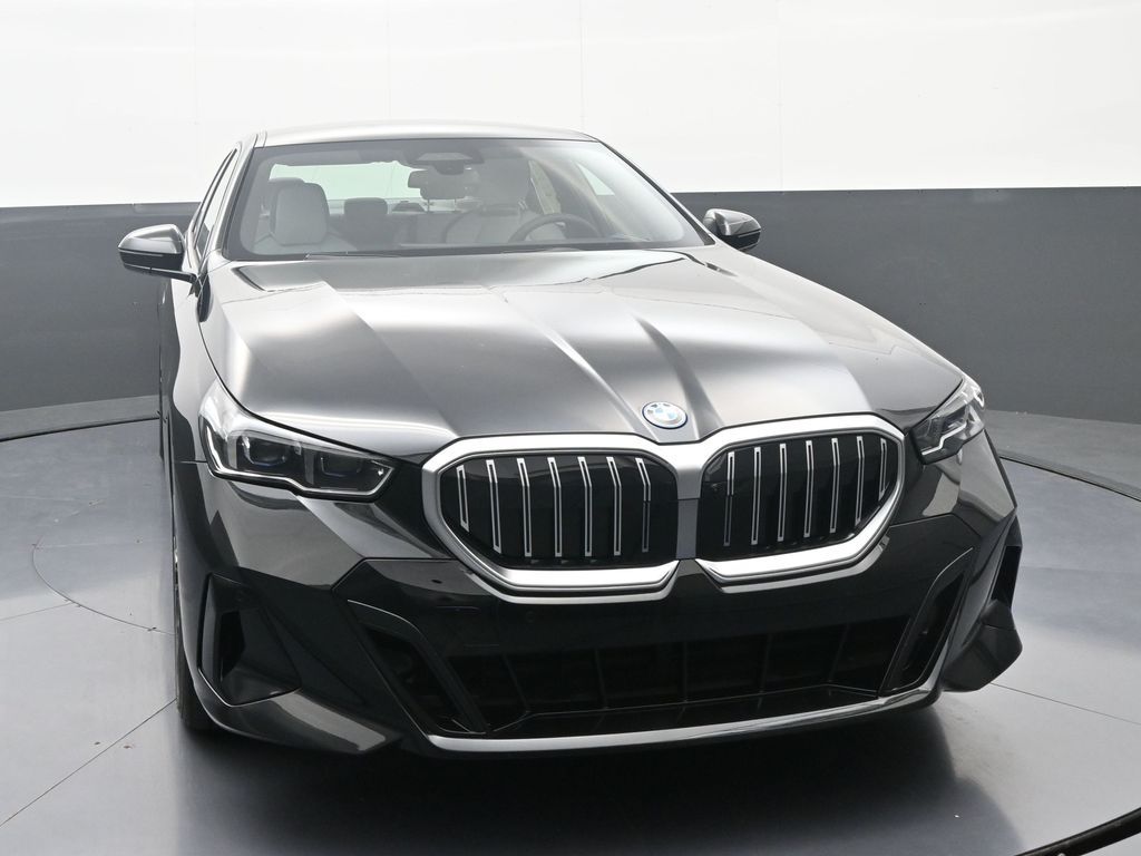 2026 BMW 5 Series 550e - Photo 2