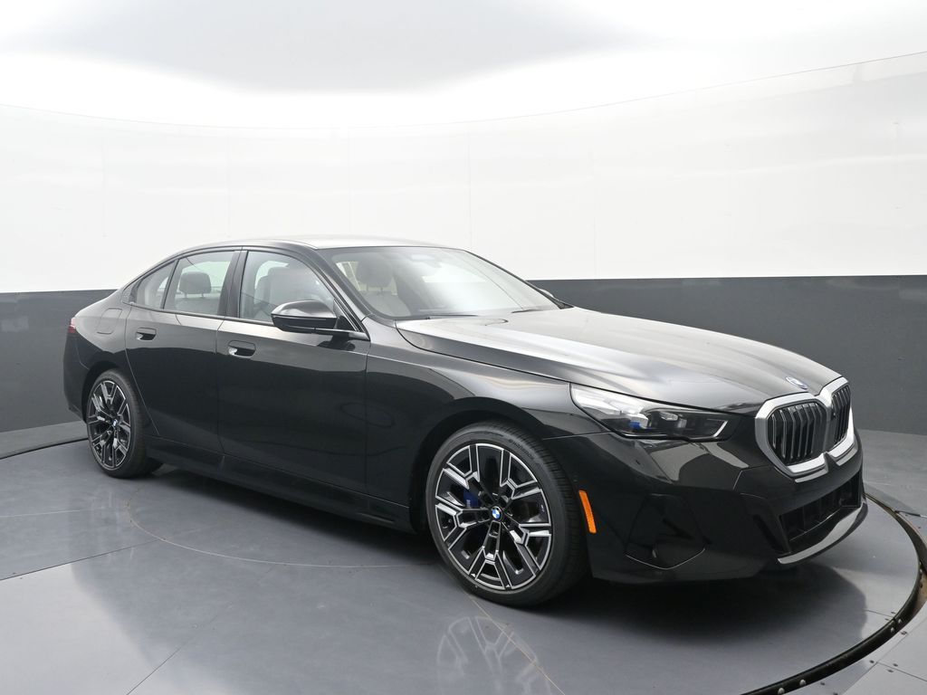 2026 BMW 5 Series 550e - Photo 3