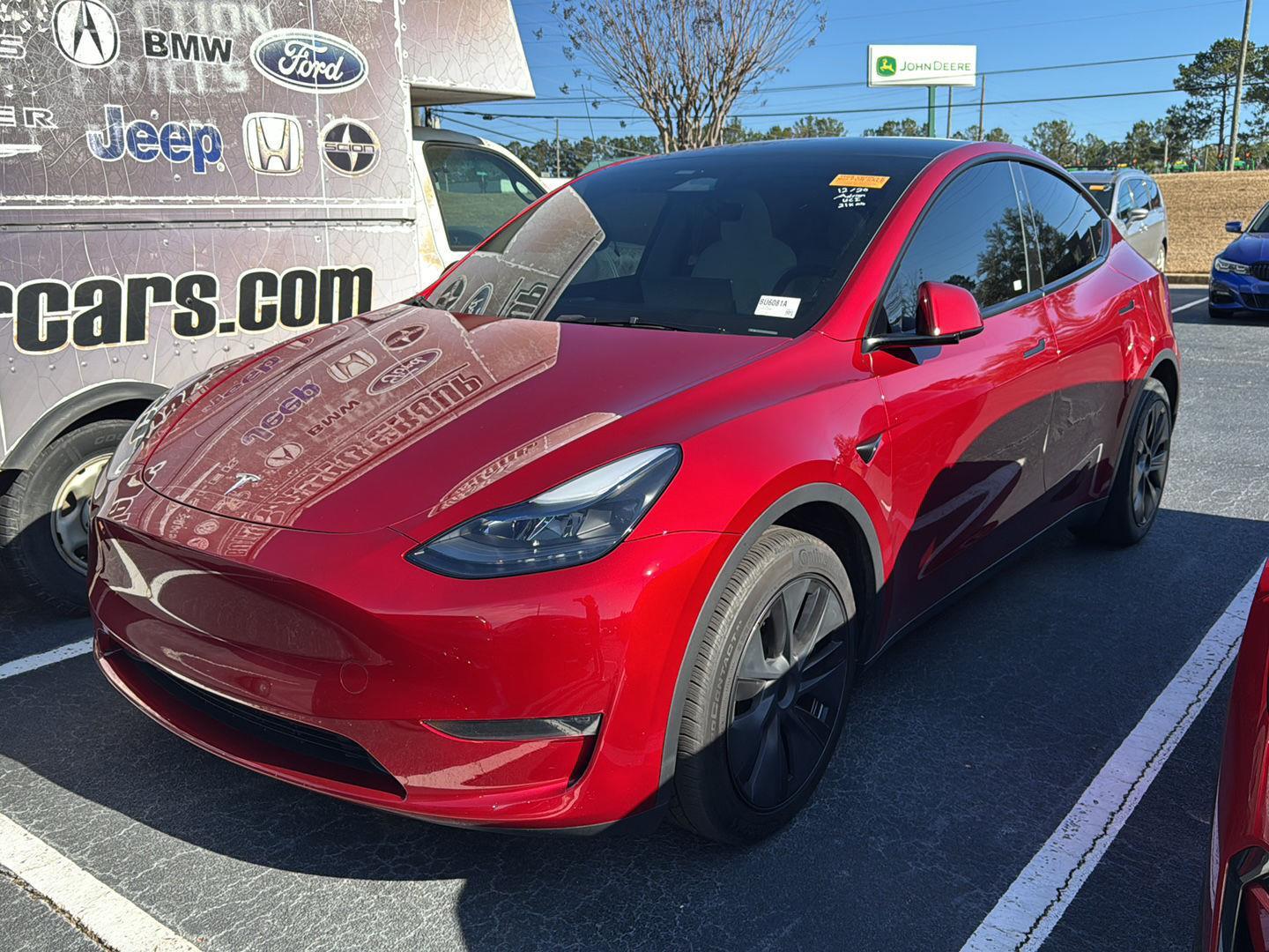 Used 2024 Tesla Model Y Long Range with VIN 7SAYGDEEXRA300024 for sale in Northfield, Minnesota