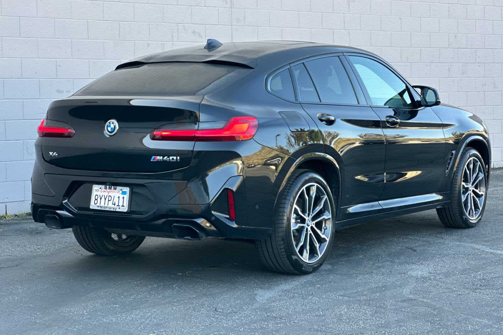 Pre-Owned 2022 BMW X4 M40i Sports Activity Coupe Black Sapphire 