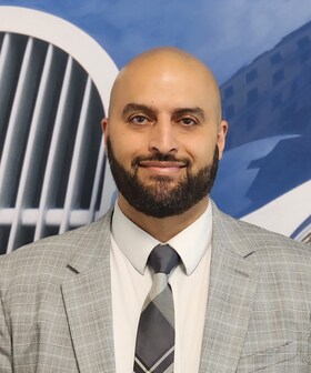 Staff member Amir Mohsin from ID_fb5eb9c16f8b