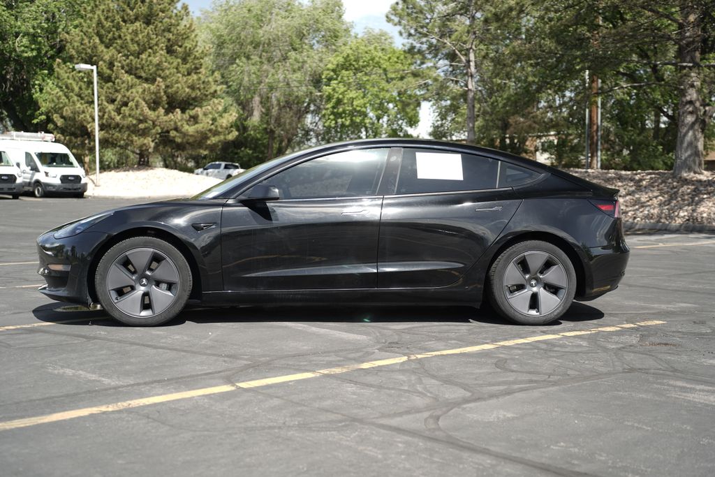 Used 2021 Tesla Model 3 Base with VIN 5YJ3E1EA7MF053114 for sale in Murray, UT