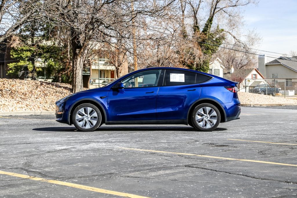 Used 2024 Tesla Model Y Long Range with VIN 7SAYGDEE1RA235211 for sale in Northfield, Minnesota