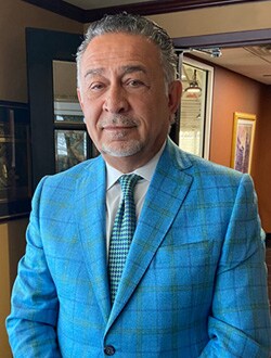 Staff member Terry Rafih (Executive Chairman CEO) from ID_5de893946ae4