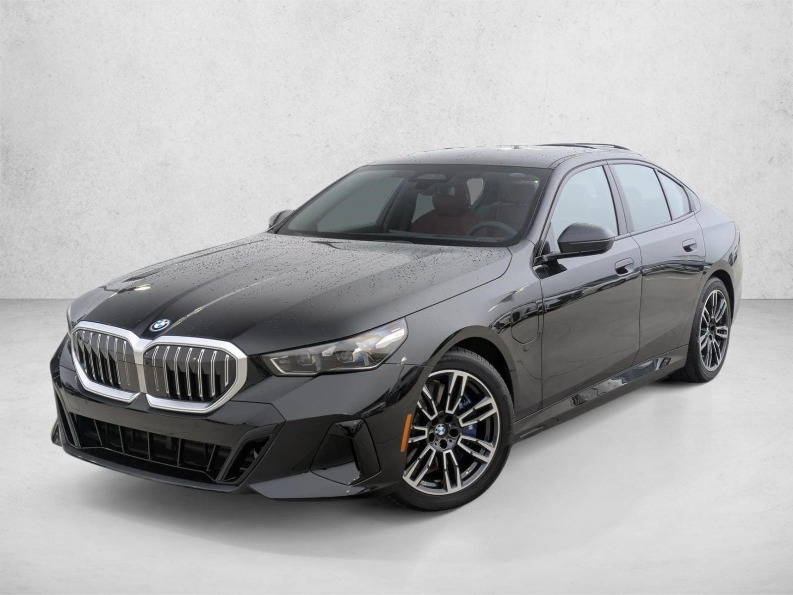 2026 BMW 5 Series 550e xDrive Sedan's photo