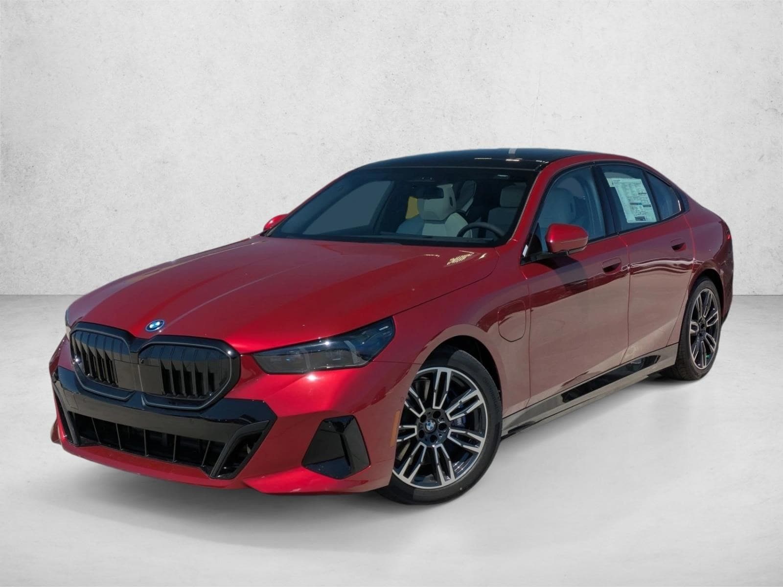 2027 BMW 5 Series 550e xDrive Sedan's photo