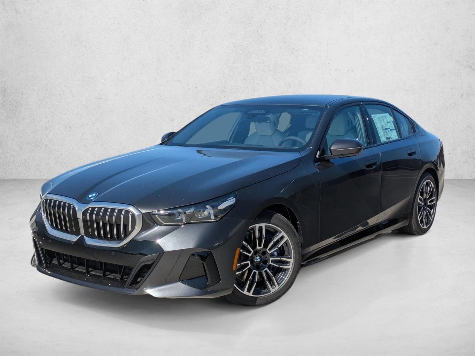 2027 BMW 5 Series 550e xDrive Sedan's photo