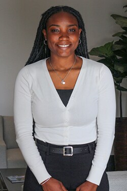 Staff member Qiera G. from 4c290b7b3479