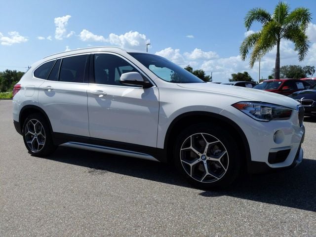 Used 2019 BMW X1 28i with VIN WBXHU7C57K3H46394 for sale in Sarasota, FL