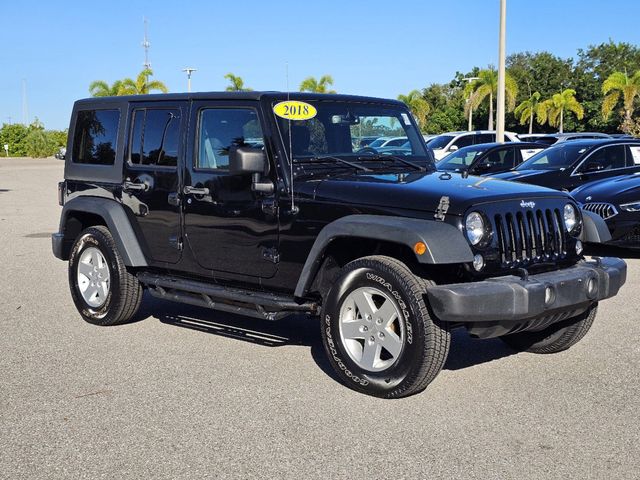 Used 2018 Jeep Wrangler JK Unlimited Sport S with VIN 1C4HJWDGXJL929509 for sale in Sarasota, FL