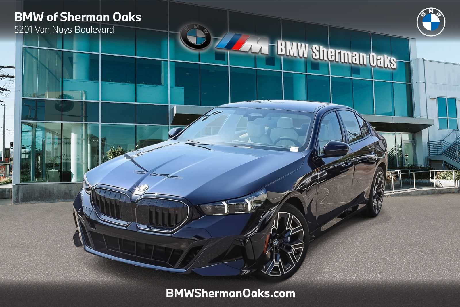 2026 BMW 5 Series 550e xDrive Sedan's photo
