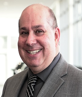 Staff member Gene Kalp from 8bd37cd5461b