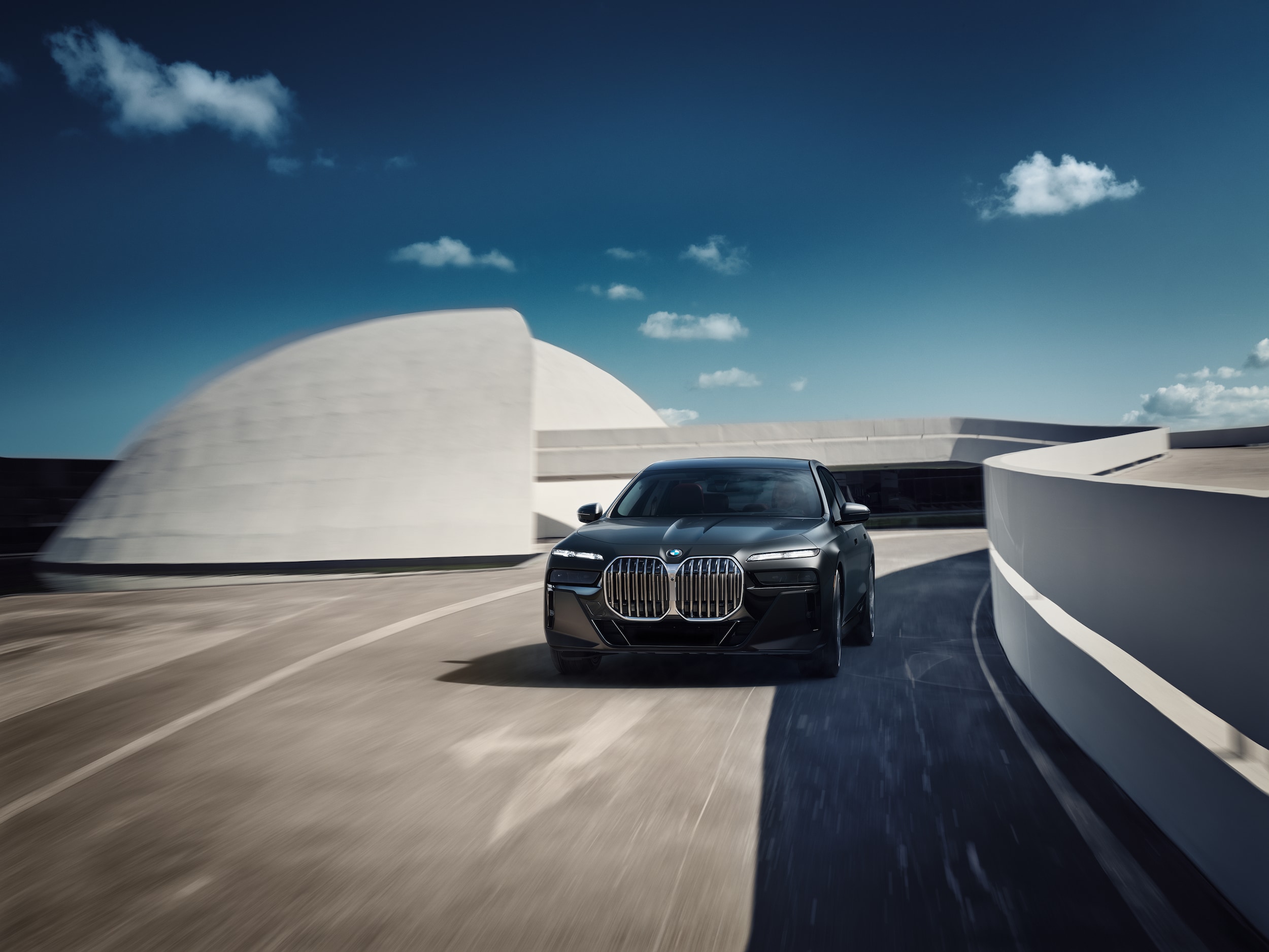  BMW 740i driving on road