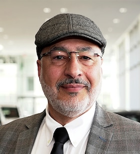 Staff member Ash Shaker from 8bd37cd5461b