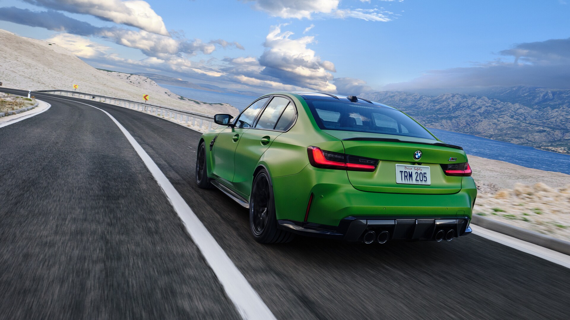  BMW M3 driving on road