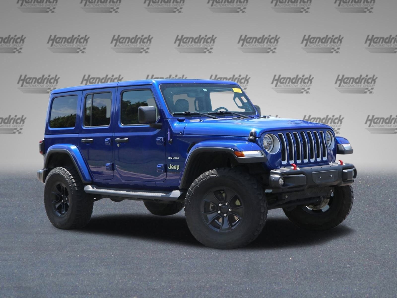 Used 2020 Jeep Wrangler Unlimited Sahara with VIN 1C4HJXEN5LW121380 for sale in Austin, TX