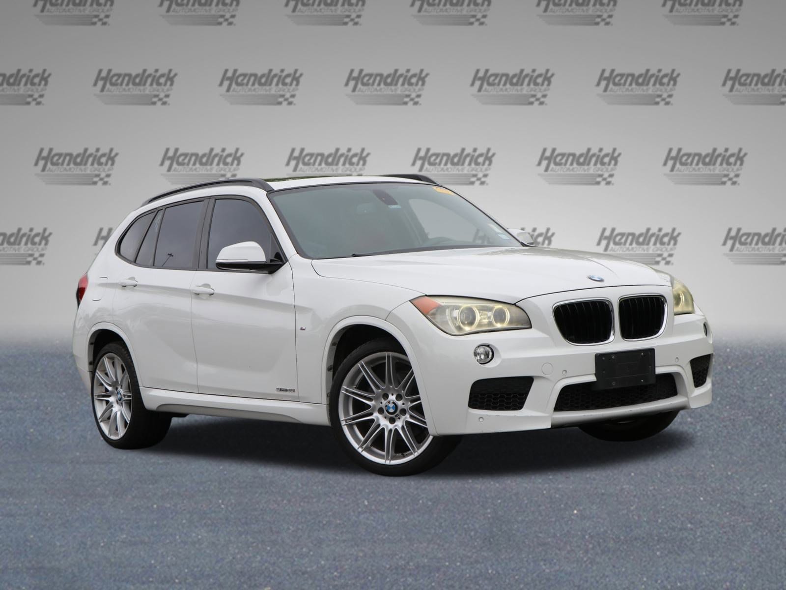 Used 2014 BMW X1 28i with VIN WBAVM1C50EVW54284 for sale in Austin, TX