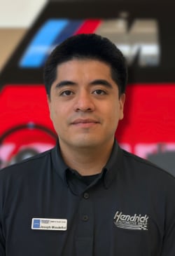 Staff member Joseph Masdefiol from ID_72c7b672e5db