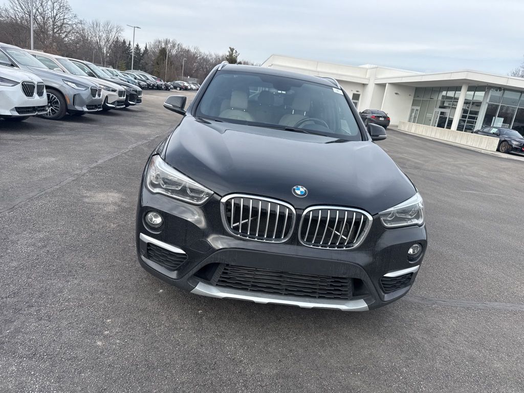 Used 2017 BMW X1 28i with VIN WBXHT3Z36H4A58021 for sale in Toledo, OH