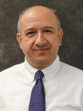 Staff member Sammy Wahidy from ID_e0227c8ca8b2