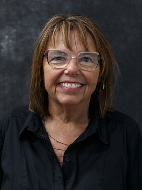 Staff member Leslie Tabarez from ID_0b7b00366eed