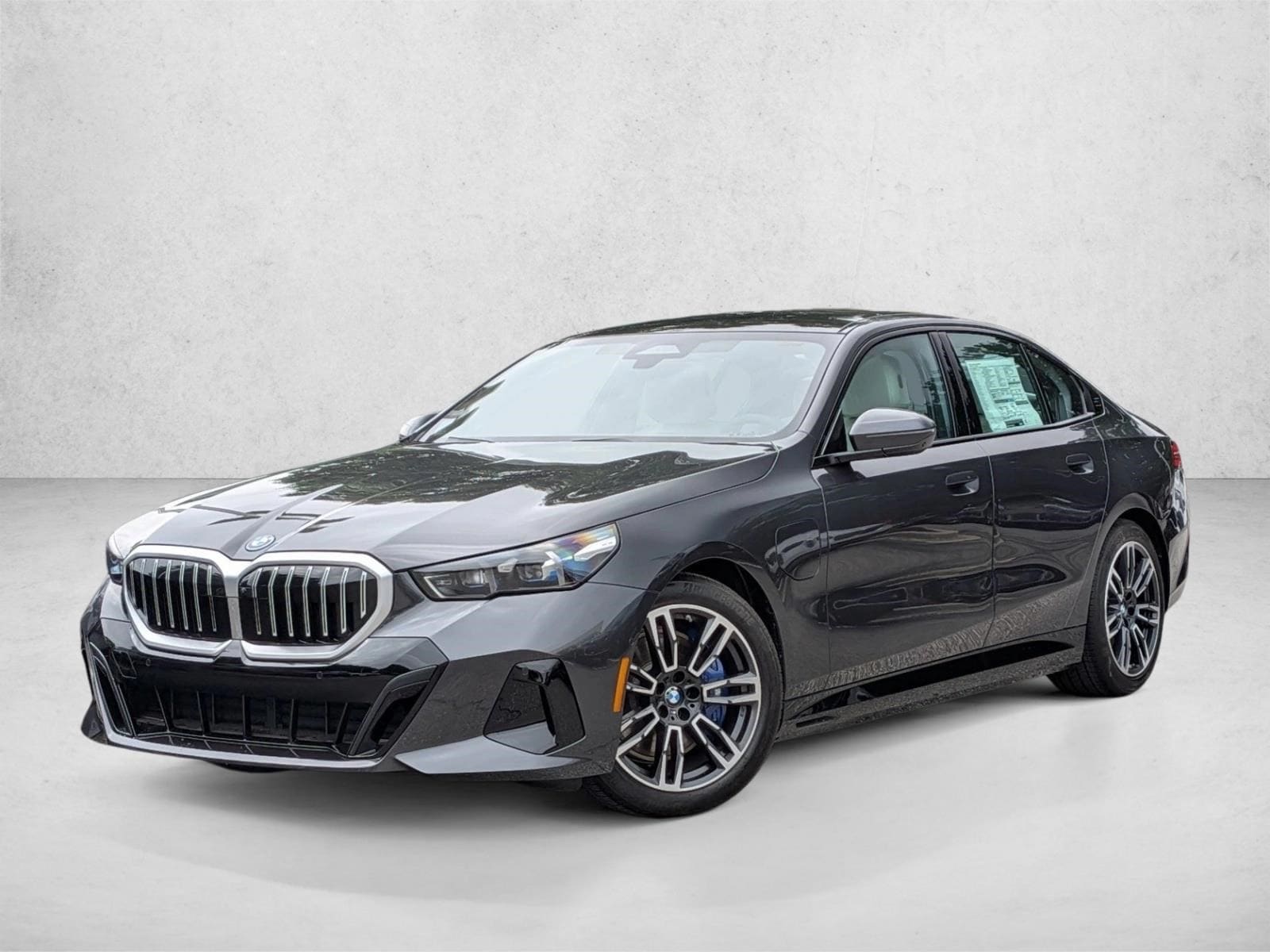 2026 BMW 5 Series 550e xDrive Sedan's photo