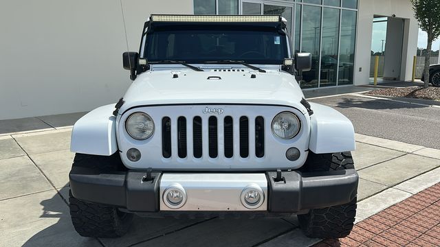 Used 2014 Jeep Wrangler Unlimited Sahara with VIN 1C4BJWEG4EL307434 for sale in Tuscaloosa, AL