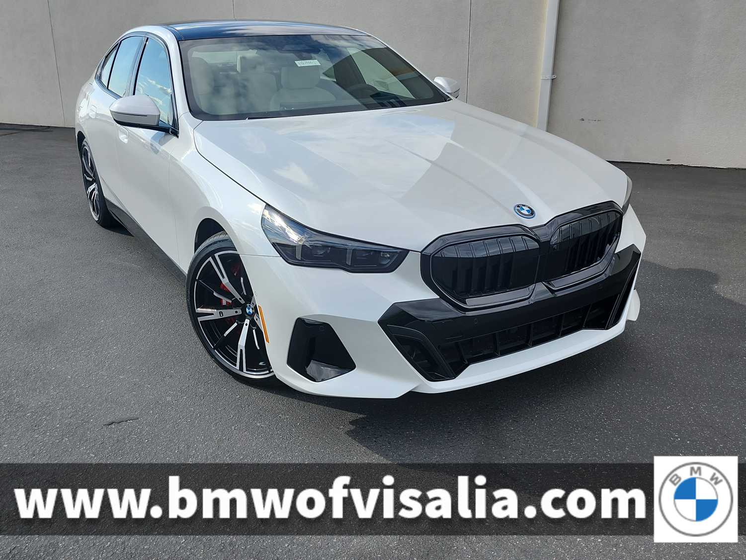 2026 BMW 5 Series 550e xDrive Sedan's photo