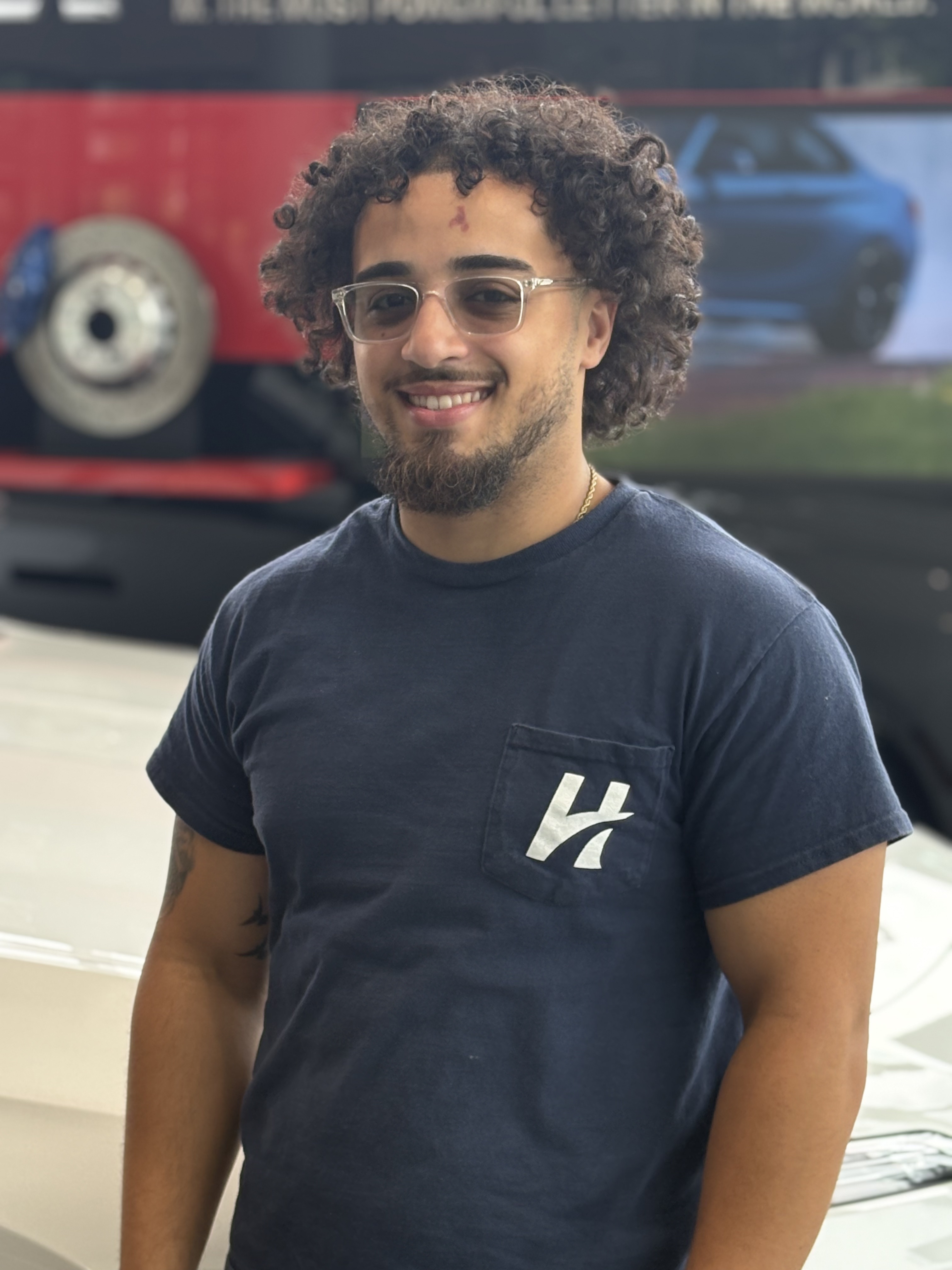 Staff member Cesar Candelario from 7562bf2f2ddc