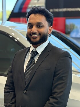 Staff member Muhammad Ahmad from 8e78f7a4c5a3