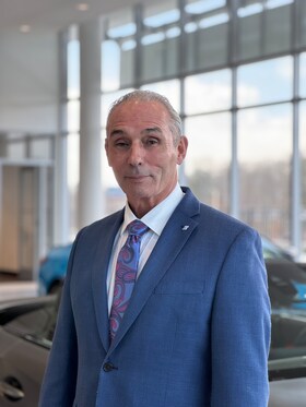 Staff member Dennis Smith from 8e78f7a4c5a3