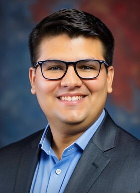 Staff member Elijah Reyes from ID_190b9fc30df7