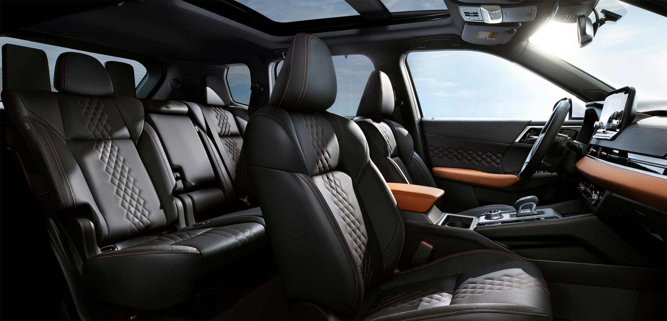 2023-mitsubishi-outlander-phev-suv-black-interior-third-row-seating.jpg