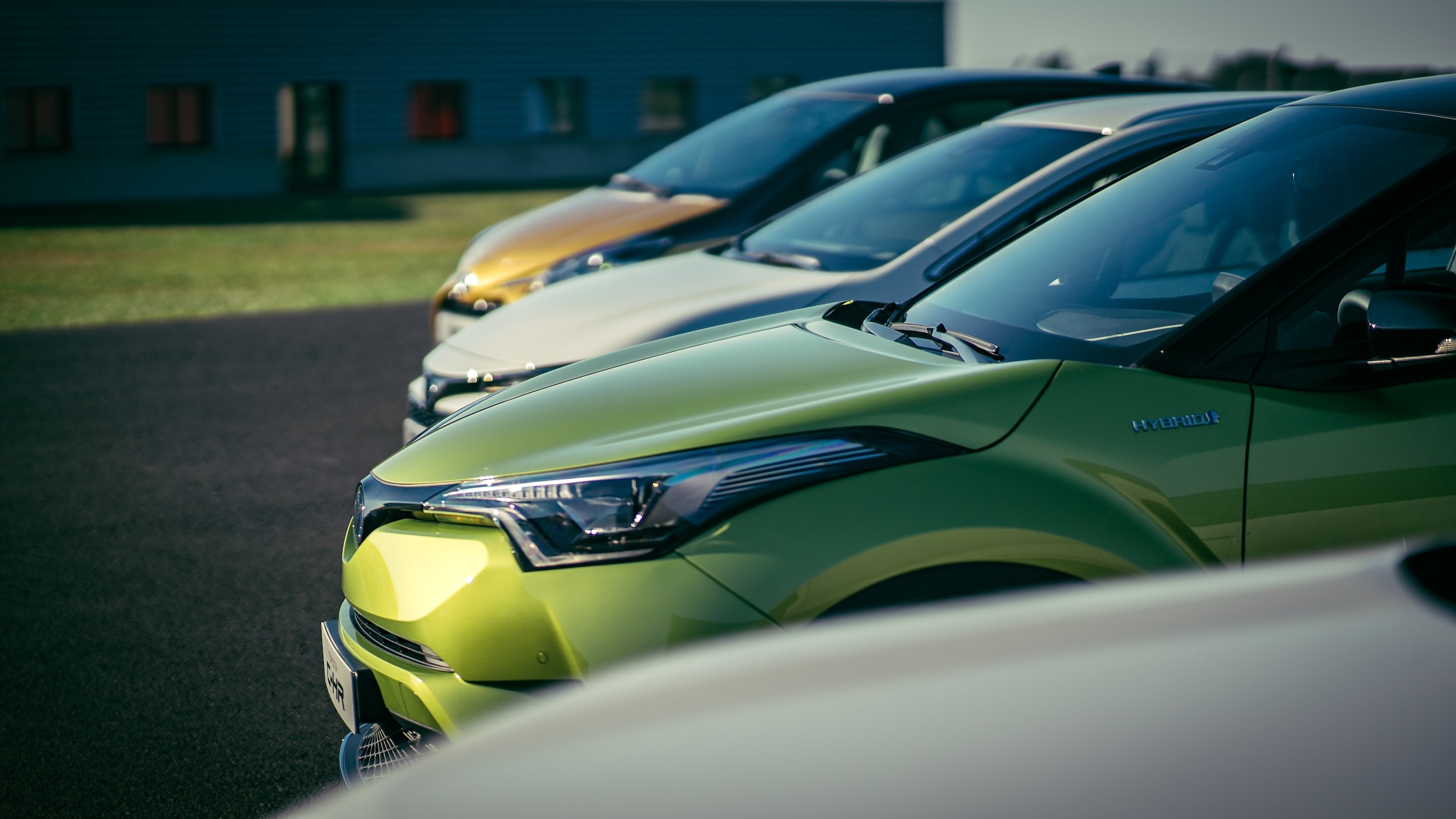 Line up of parked cars in a parking lot.jpeg