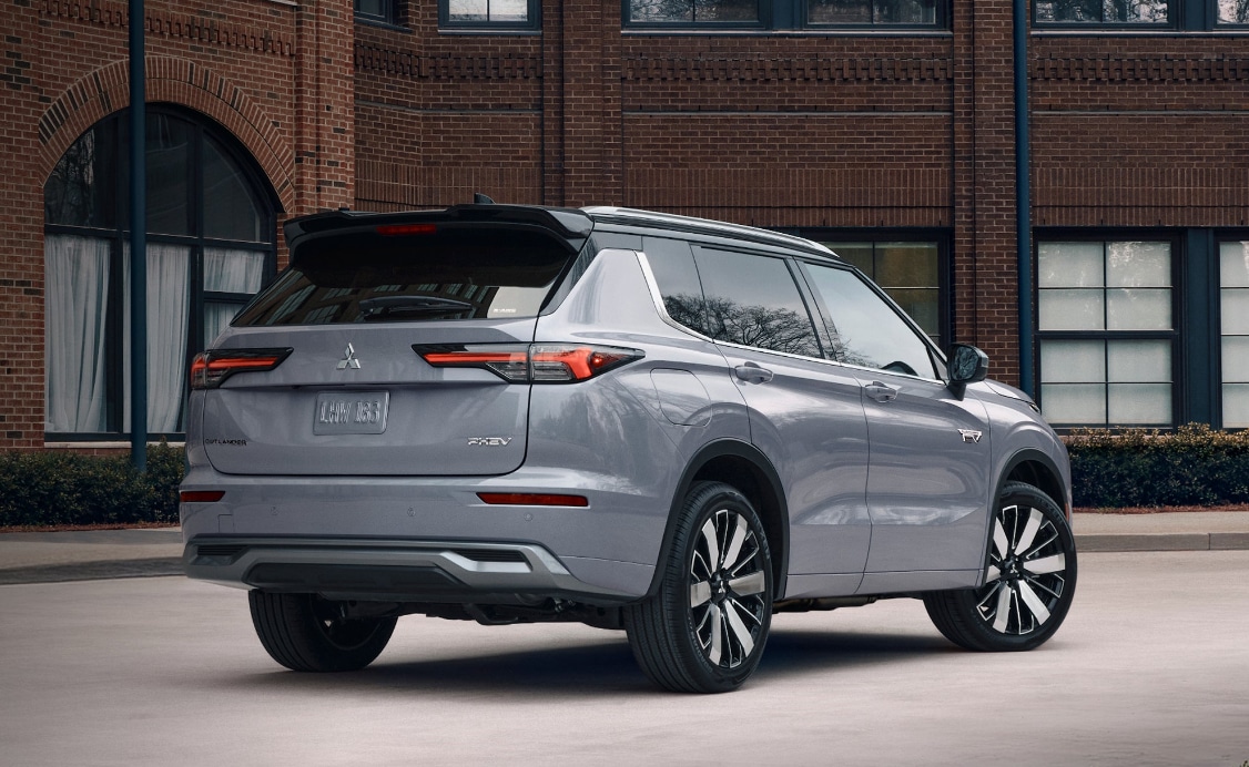 Rear%20angle%20view%20of%20a%20metallic%20gray%20Mitsubishi%20Outlander%20PHEV%20SUV.png