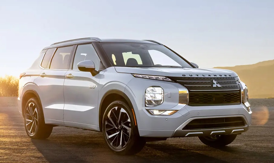 Mitsubishi Plug-in Hybrid driving down road