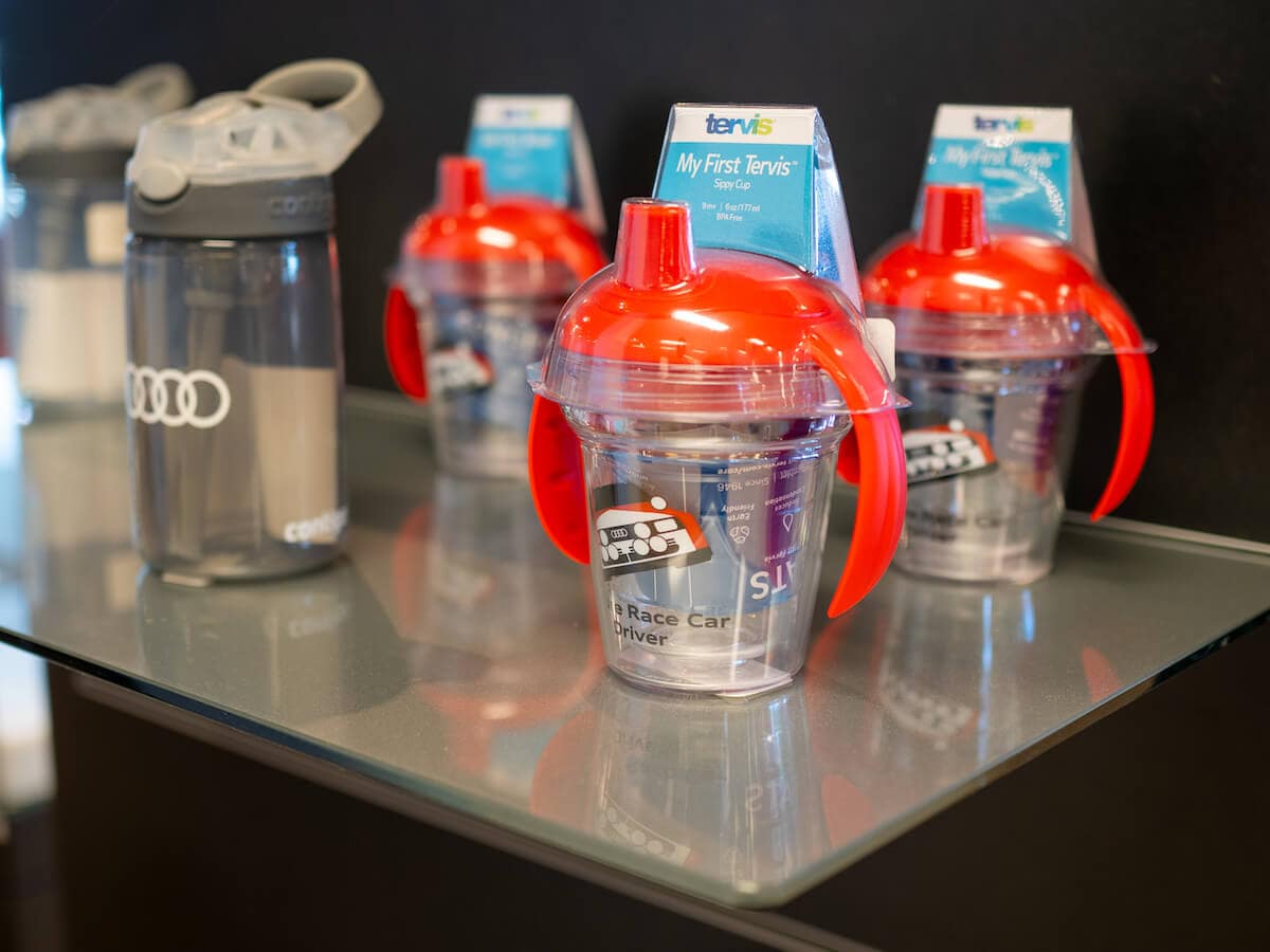 Audi-branded cups and bottles at Audi Plano