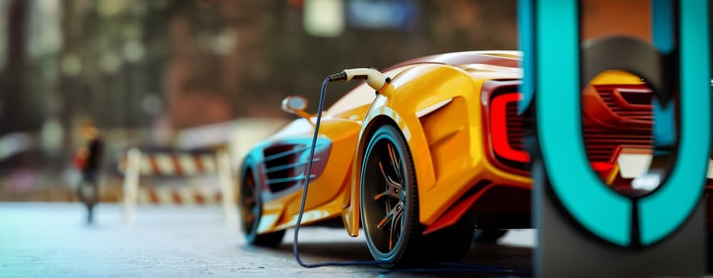 Electric%20Exotic%20Car%20Plugged%20in%20and%20Charging.jpg