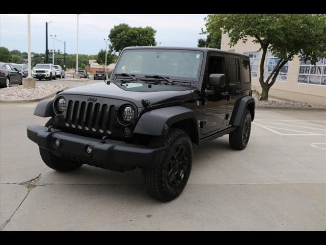 Used 2014 Jeep Wrangler Unlimited Sport with VIN 1C4BJWDG2EL157650 for sale in Kansas City