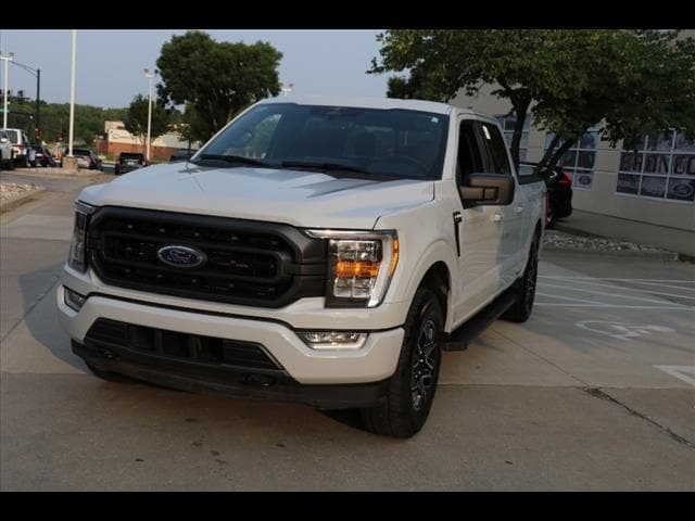 Used 2023 Ford F-150 XLT with VIN 1FTFW1E84PFB54456 for sale in Kansas City
