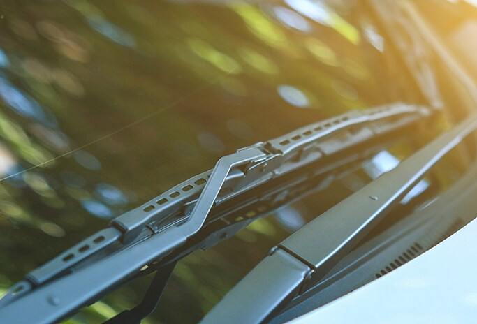 How to Get Your Car Summer Ready at Bobby Rahal Acura in Mechanicsburg, PA | Detailed look of wiper blades on top of front windshield 