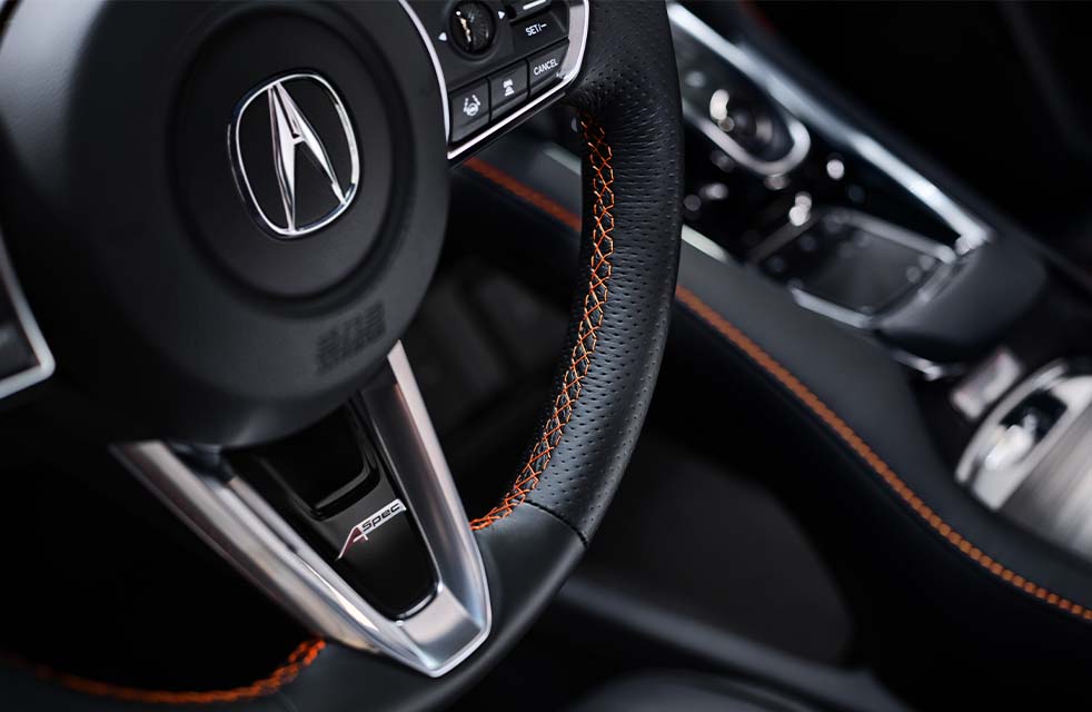 Compare the 2021 Acura RDX vs. the 2022 Audi Q5 at Bobby Rahal Acura | Detail Shot of Steering Wheel in the 2021 Acura RDX