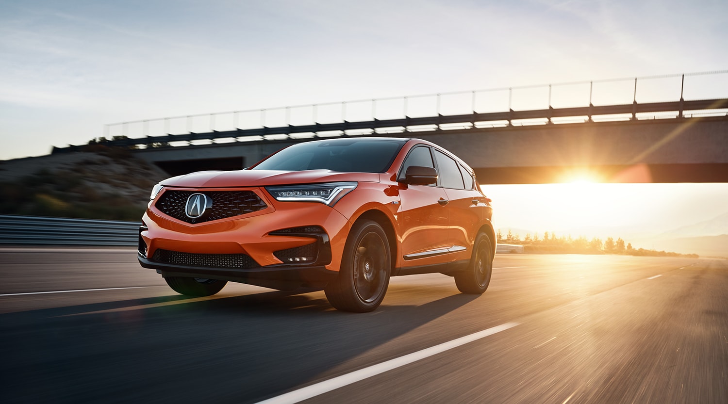 Bobby Rahal Acura is a Car Dealership near New Cumberland PA | The 2021 Acura RDX driving on highway