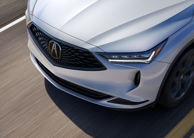 Compare the 2020 Acura MDX and the 2022 Acura MDX at Bobby Rahal Acura | Close-up of MDX's hood while driving 